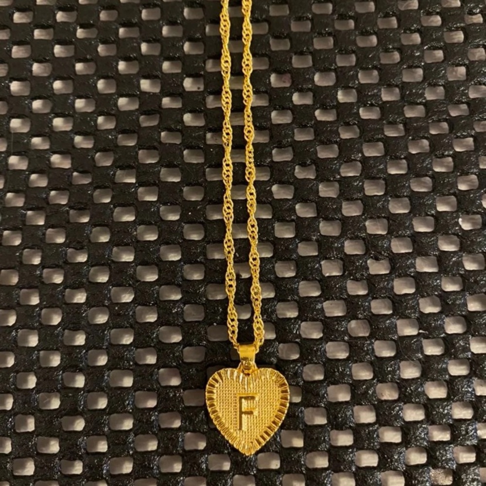 F heart shaped necklace